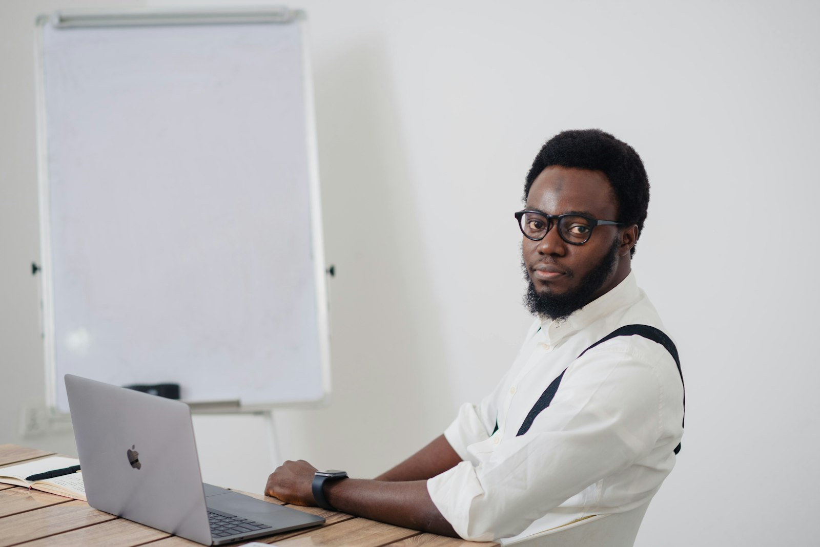 A young Cameroonian professional reviewing a banking app